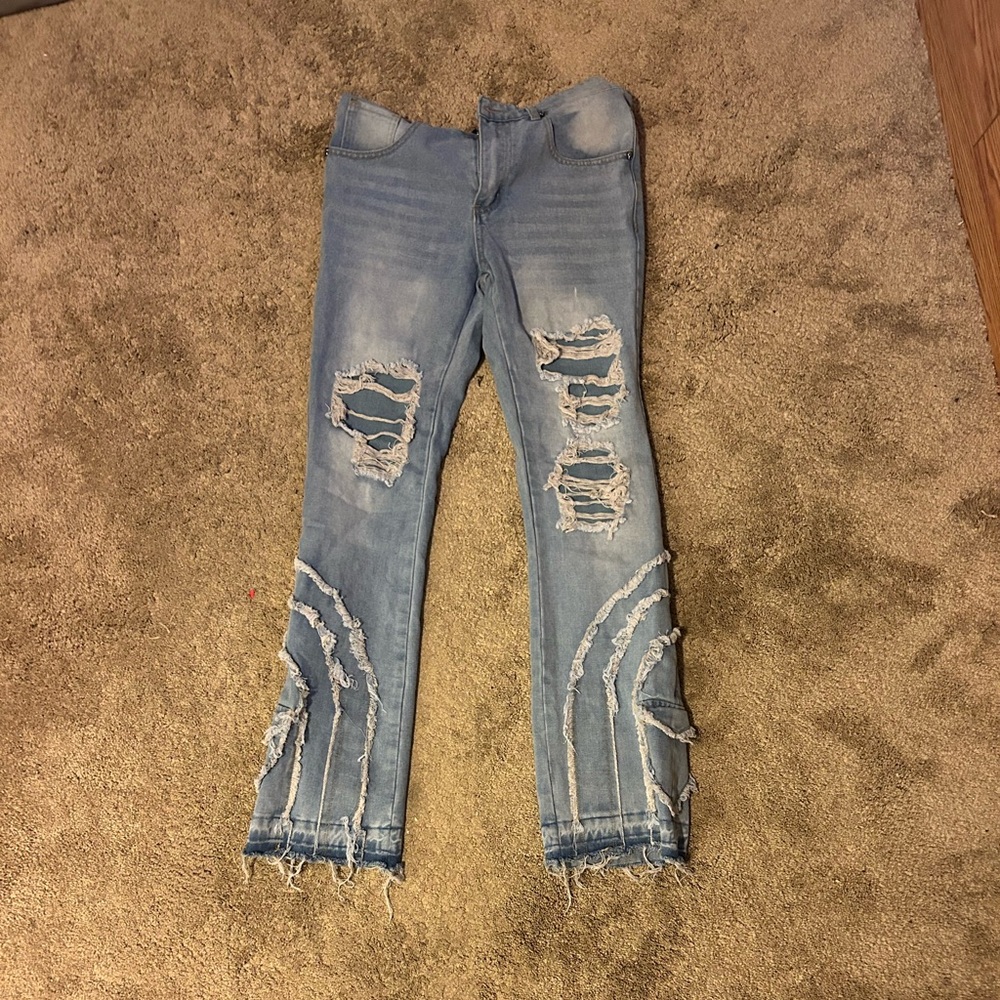 Distressed flare blue jeans
